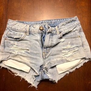 Light wash ripped jean shorts